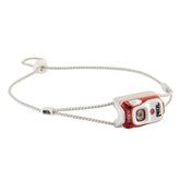 Petzl Bindi headlamp front view, ultra-compact and easy to carry on the go.