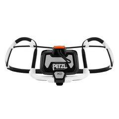 Petzl IKO headlamp mounted on a helmet for versatile activity lighting