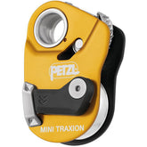 Petzl Mini Traxion on anchor shows triple-action opening for easy placement.
