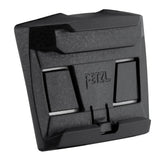 Petzl helmet mounting plate in use, enabling headlamp pivot without obstruction.