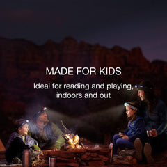 Child wearing PETZL TIKKID headlamp for hands-free visibility during play