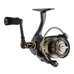 Pflueger Supreme XT in-hand use showing carbon handle for balanced control.
