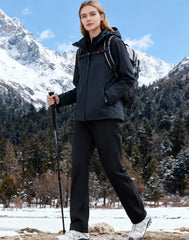 Pioneer Camp women's softshell pants windproof stretch fabric ready for rugged winter treks.