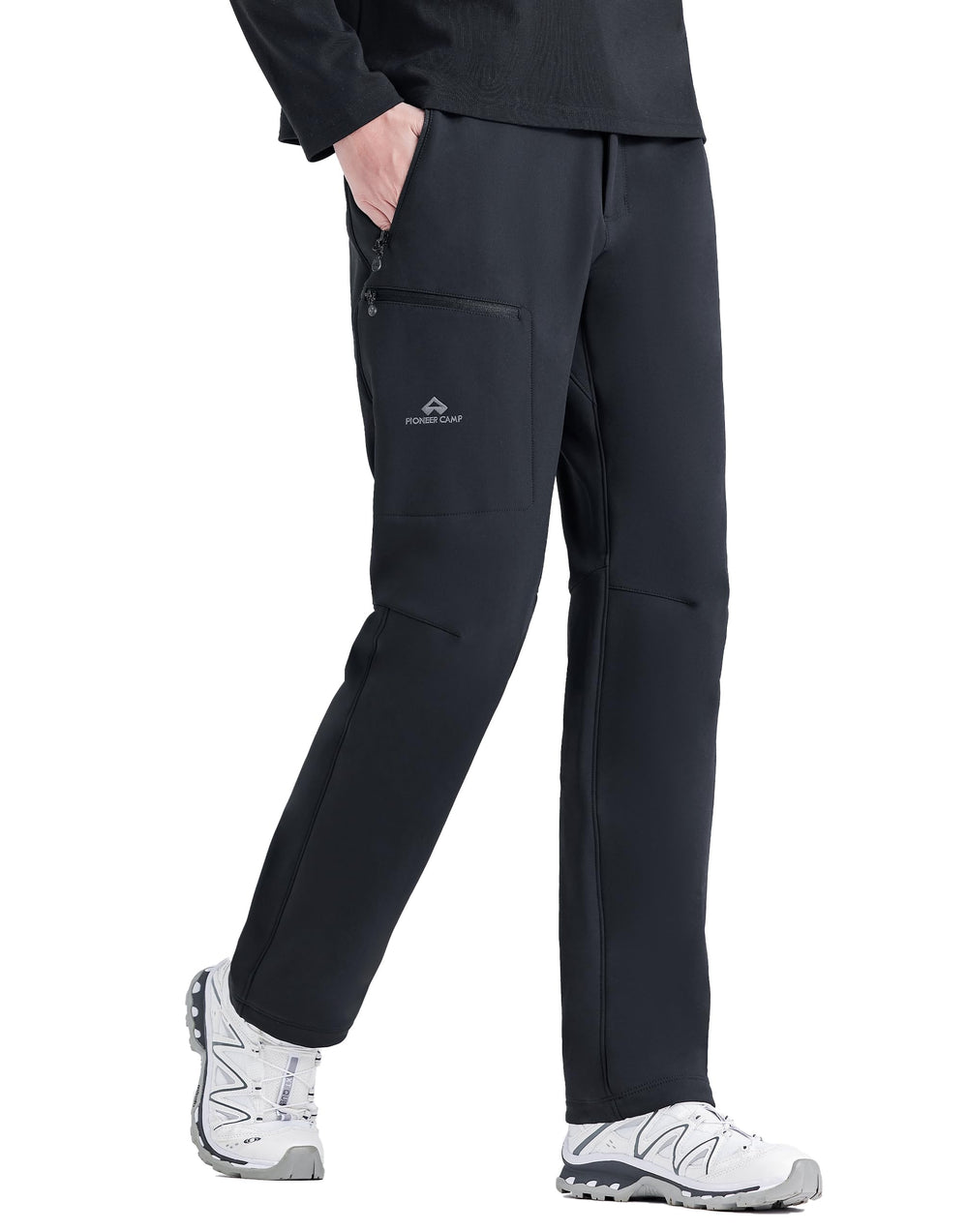 Pioneer Camp women's softshell pants outer view highlighting waterproof performance for snowy hikes.