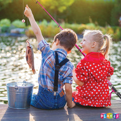 Spincast reel attached to pink fishing pole with easy-grip handle
