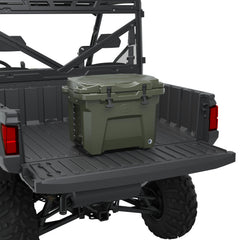 Polaris NorthStar 30 Qt cooler in rugged trail setting with tie-down cleats