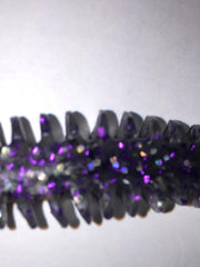 Poor Boy's Baits Smoke Purple Erie Darter Grey in water action, demonstrating lifelike movement.