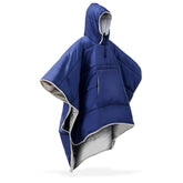 Preboun thermal poncho navy folded for compact travel warmth on the go.
