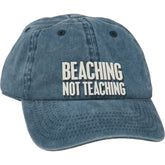 Primitives by Kathy Beaching Not Teaching baseball cap with cream embroidery for sunny beach days.