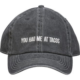 Primitives by Kathy taco cap front view with embroidered slogan for casual wear.