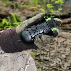 PRIMOS Bombshell PS209 in-hand shot, rugged black finish for field reliability.