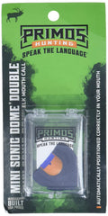 Primos Mini Sonic Dome estrus cow call close-up reveals dual-reed output for authentic tones