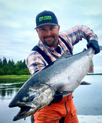 Pro-Cure Salmon Slammer bottle with UV flash highlights premium lure scent for salmon.