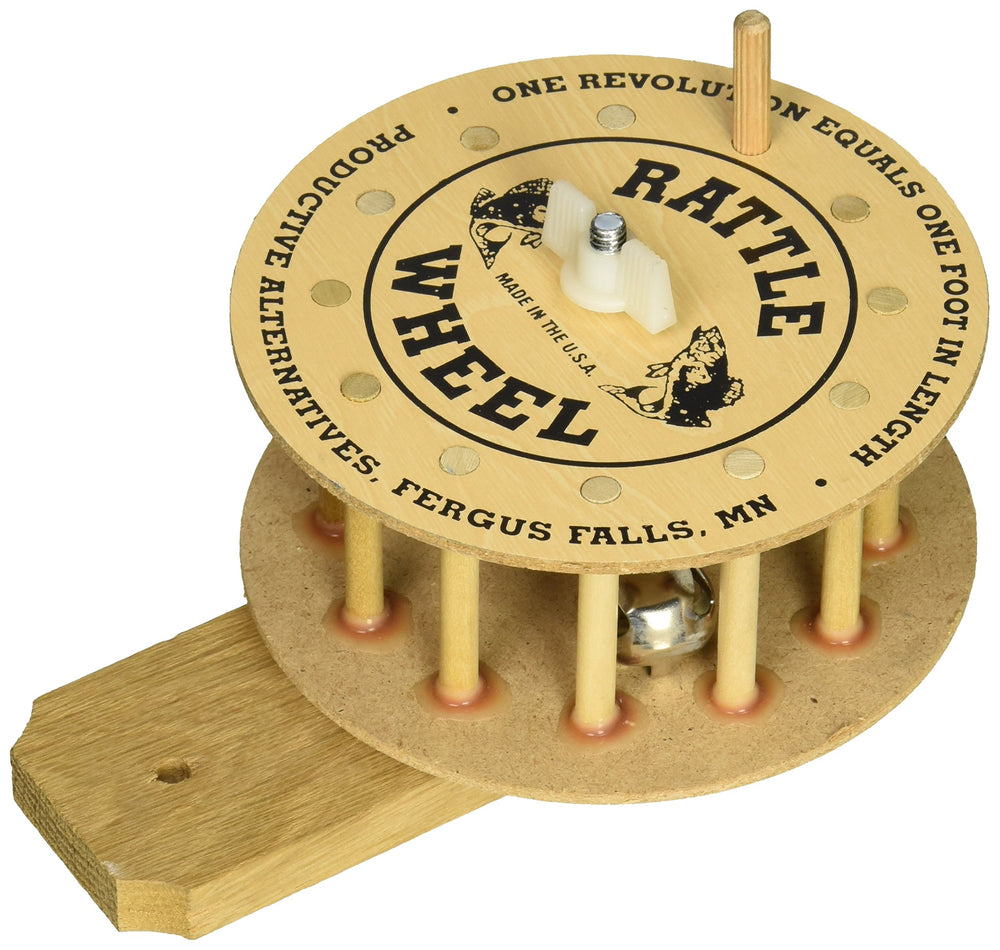 Productive 101 Rattle Reel Wall Mount on a cabin wall for easy ice fishing reel access.