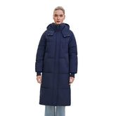 PUFFIT long puffer jacket worn by a model outdoors for reliable winter warmth