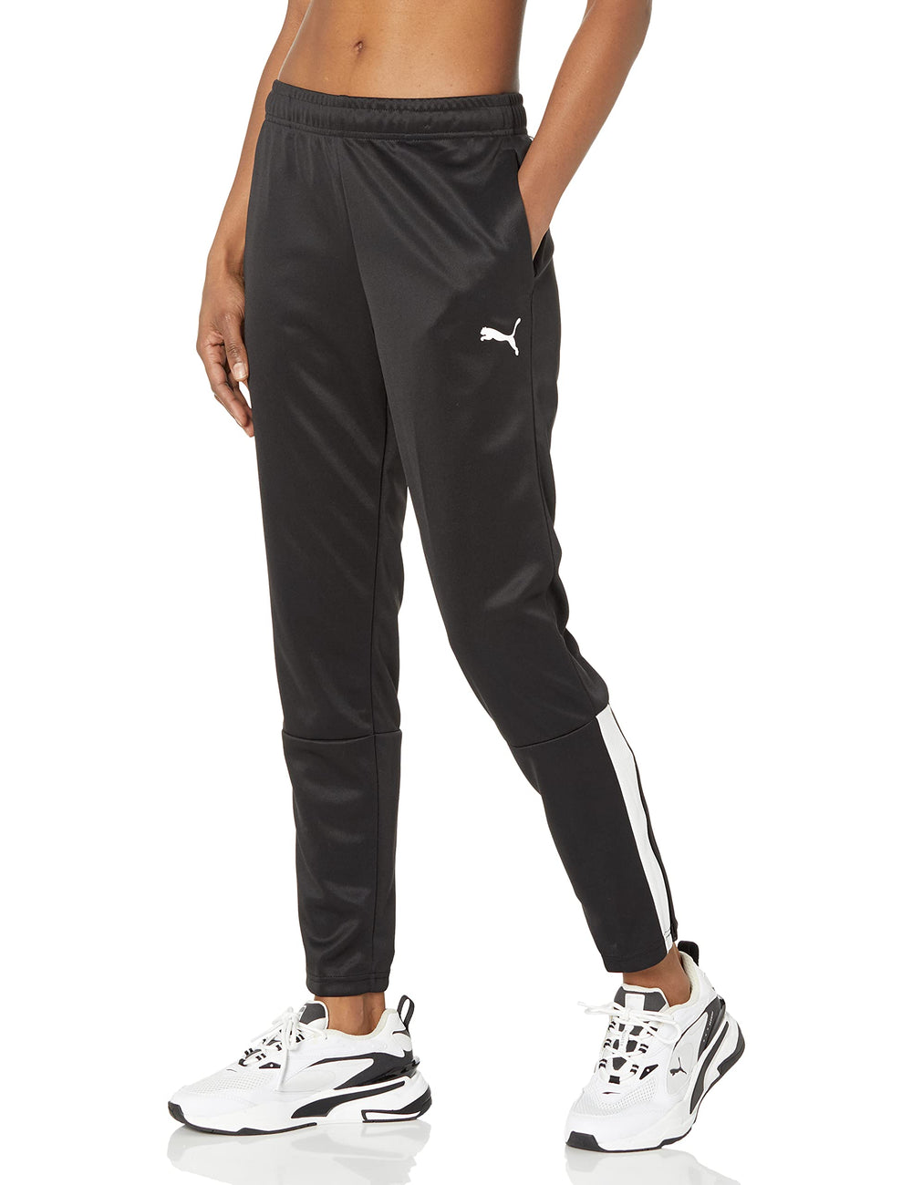 PUMA Teamliga training pants side view in black and white, moisture-wicking comfort for workouts.