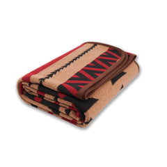 PuTian Merino Wool Blanket folded on couch delivers soft warmth for chilly evenings.