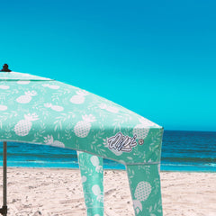 Qipi Beach Cabana corner pockets keep sunscreen and phone within reach
