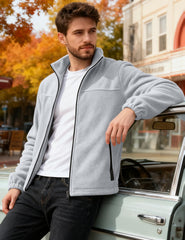 QOSOQ fleece jacket with pockets provides secure storage during outdoor activities.