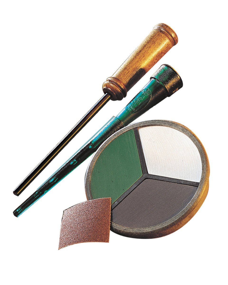 Quaker Boy Triple Threat Turkey Call in black with three surfaces for versatile turkey sounds.