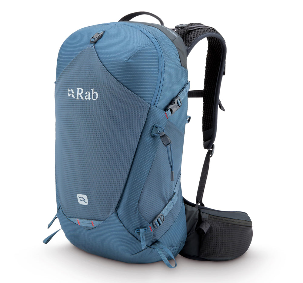 Rab Protium ND18L backpack on a trail, ready for a day hike.