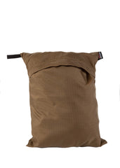 Raine Waterproof Rucksack Cover folded into carrying pouch for compact transport.