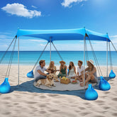 Raynesys Beach Tent 10x10 sky blue shading a sunny family beach day
