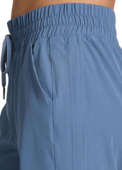 RBX wide leg pant with side pocket highlighted for secure storage during activities.
