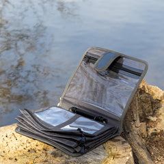 Reaction Tackle Deluxe Speed Binder pocket-inside focus showcases versatile storage for soft plastics and hooks.