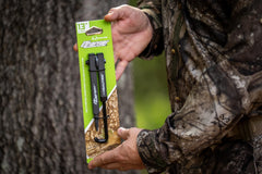 Folded arms demonstrate portability for mobile treestand setups.