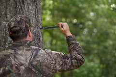 Realtree EZ Hanger secured to a tree with a screw mount for stable positioning