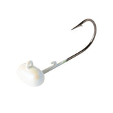 Rebel Lures KEG Head Jig Pearl 1/10 oz front view with wobble near rocks.
