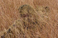 Red Rock ghillie suit pants with stitched openings for quick pocket access