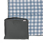 RED ROVR folded compact blanket for easy storage and quick setup.