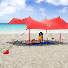 Red Suricata family beach tent shows full-height shade for family play and sun protection