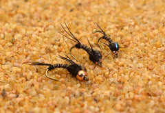 Region Fishing bead-head black micro mayfly nymph, side view, ideal for midges and emergers feeding