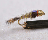 Region Fishing bead head hares ear mayfly nymph with gold rib for lifelike underwater profile.