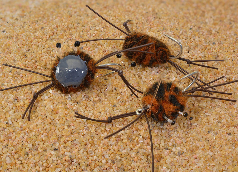 Region Fishing camo crab saltwater fly on Duratin hook for permit and bonefish.