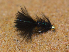 Region Fishing micro woolly bugger in action, imitating minnows and leeches to lure trout.