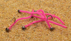 Region Fishing pink San Juan worm jig closeup showing jig hook and barbless design for cleaner hookups.
