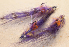 Region Fishing Redfish Crack Fly in purple hue, designed for easy cast and enticing strikes