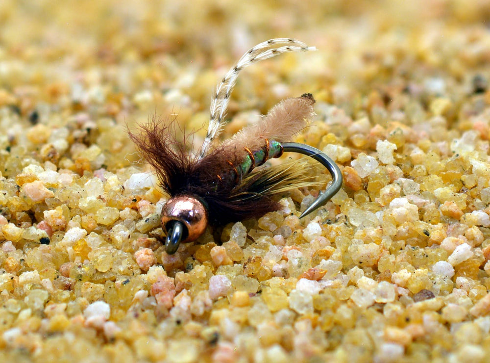 Region Fishing Tan Fox Poopah Nymph on a Mustad Heritage hook, ideal for trout in rivers