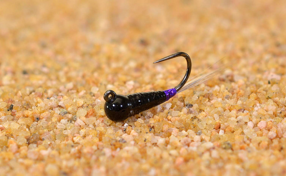 Region Fishing tungsten black purple perdigon jig head fly on Hanak hook for deep water euro-nymphing.
