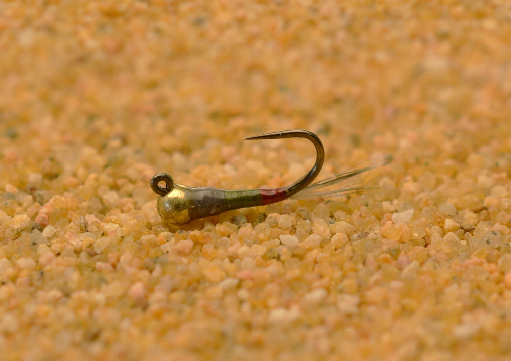 Region Fishing Tungsten bead on Perdigon for faster sinking into feeding lanes.