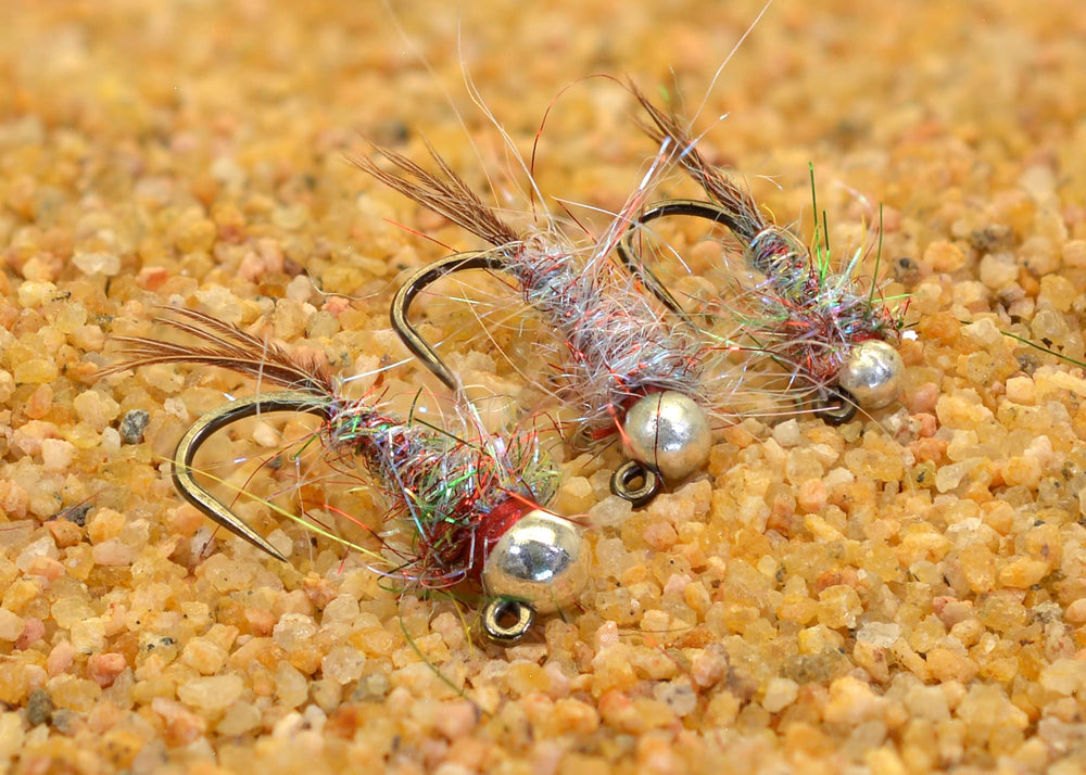 Region Fishing tungsten bead surveyor jig fly for euro-nymphing reaches feeding lanes quickly.