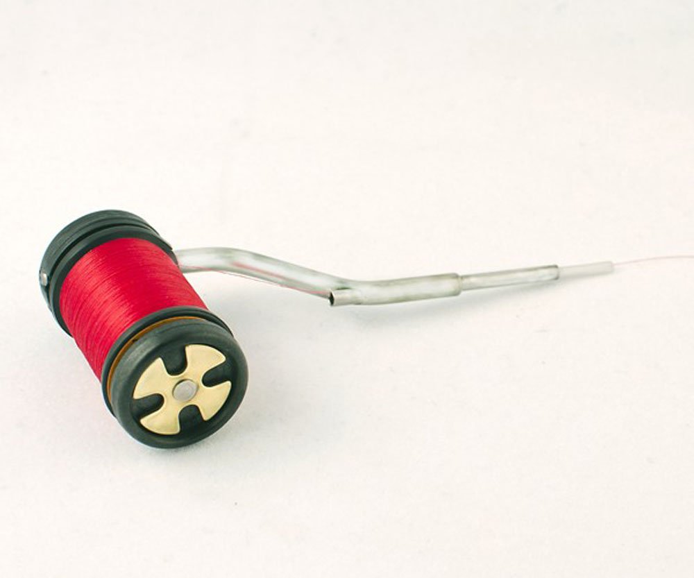 Rite Bobbin Ceramic Magnum close-up showing the zirconia ceramic insert