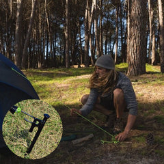 RIY heavy-duty steel tent stakes 8 inch in hand demonstrate sturdy anchoring.
