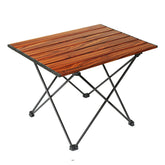 ROCK CLOUD portable camping table folded in its carry bag for easy transport.