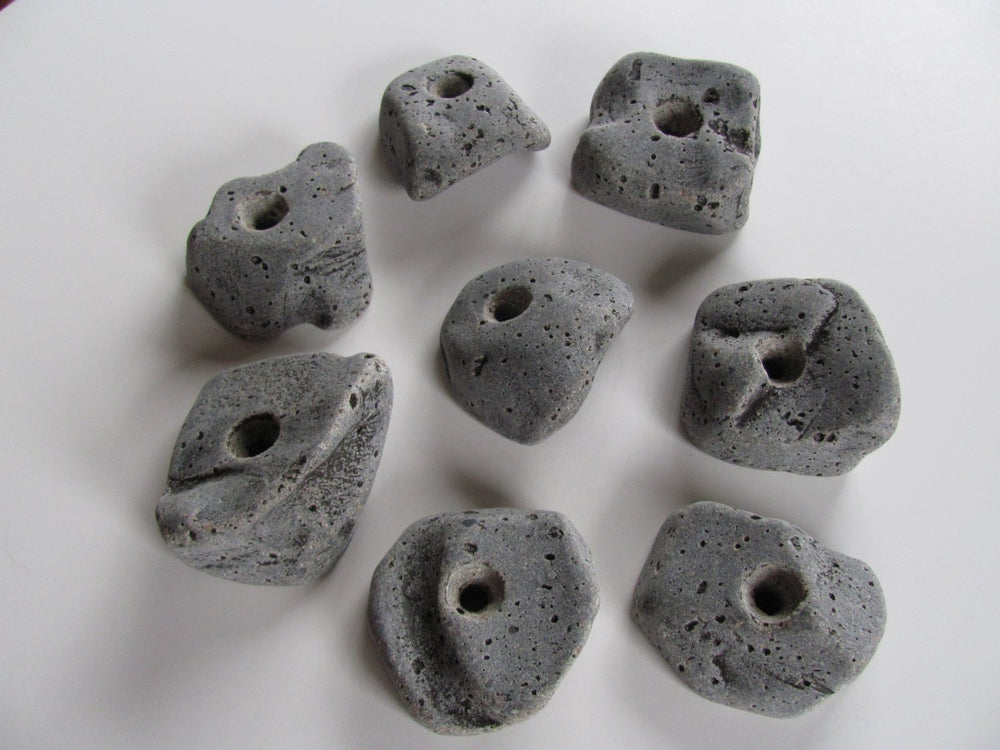 Rocky Mountain Climbing Gear bolt-on holds; close-up texture for realistic grip.