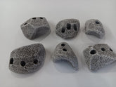 Rocky Mountain Holds granite texture demonstrates authentic grip for indoor climbing.
